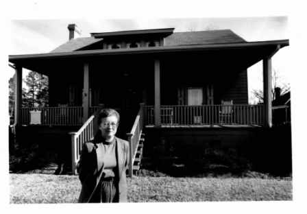 1991 image of Ann Jacobs preparing the Shurley home for restoration.
