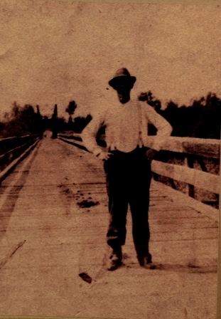 J.J. J. Robinson standing on the Irene Bridge over the Broad River.