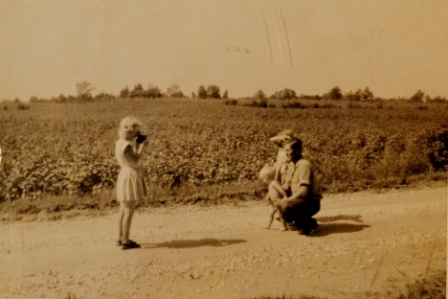 Bobby Rice, Lydia Howell and Gerry Howell on Holland Road in circa 1948. Note the cotton field in the background.