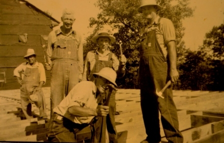 Fay Robbins, Tom Robbins, Coleman Cranford, and Tom Bankhead working on building the new church building.