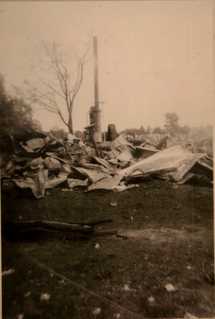 Porter Good’s cotton gin house after the fire in circa 1955.
