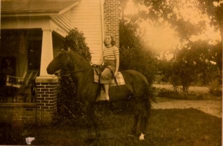 Barbara Sherer Cranford on her horse Lady at the Hugh Sherer home.