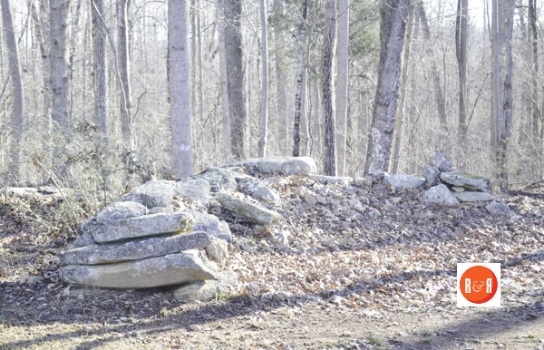 Part of the massive rock wall encompassing most of the church property and cemetery. Image taken in 2016 by R&R