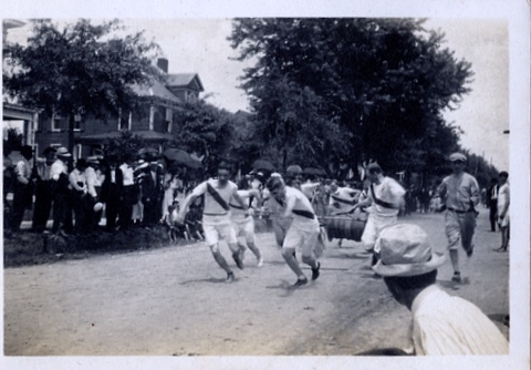 Rock Hill fire fighters competition on Oakland Ave., June 1912 was staged in front of the Strait home. The home in the background (lt) was the Cherry house, later the site of the Downtowner Motel.
