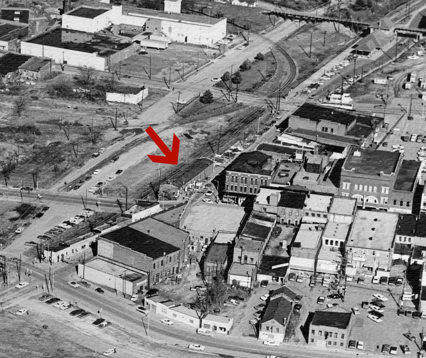 AERIAL IMAGE OF THE DOWNTOWN AREA - ARROW TO THE CRAIG WHOLESALE BUSINESS