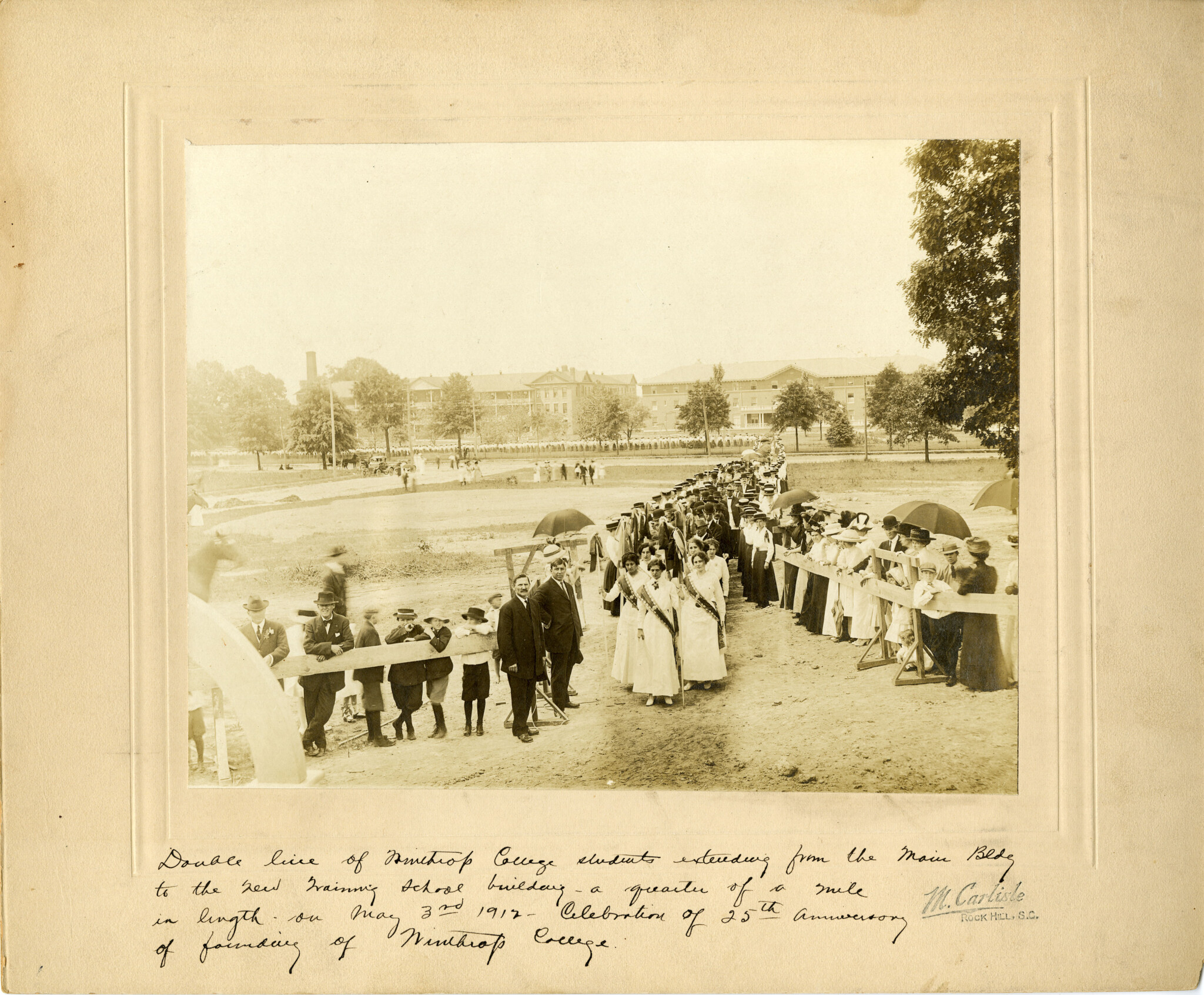 Image of line forming to celebrate the completion of WTS in 1912. Courtesy of the WU Pettus Archives - 2023