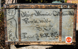 Bottom of Ms. Minnie Caldwell's 19th century travel trunk marked Rock Hill, S.C. 