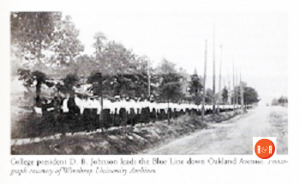 Pres D.B. Johnson leads blue line down Oakland Ave (Compressed)