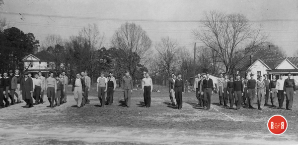 Students marching in circa 1940 showing the college’s faculty housing on College Avenue. In the 1960’s the Scott family lived in the house to the right and the Freeman family to the left. (Courtesy of the WU Pettus Archives.)