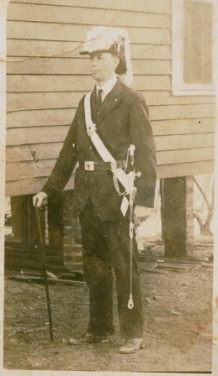 J.T. Givens in his Masonic uniform next to the house on Hampton St.