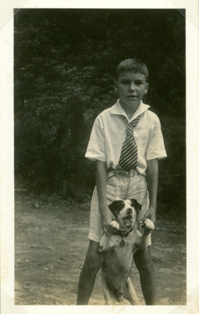 Andy White pictured with his dog. Andy took music lessons with Mrs. Adams.