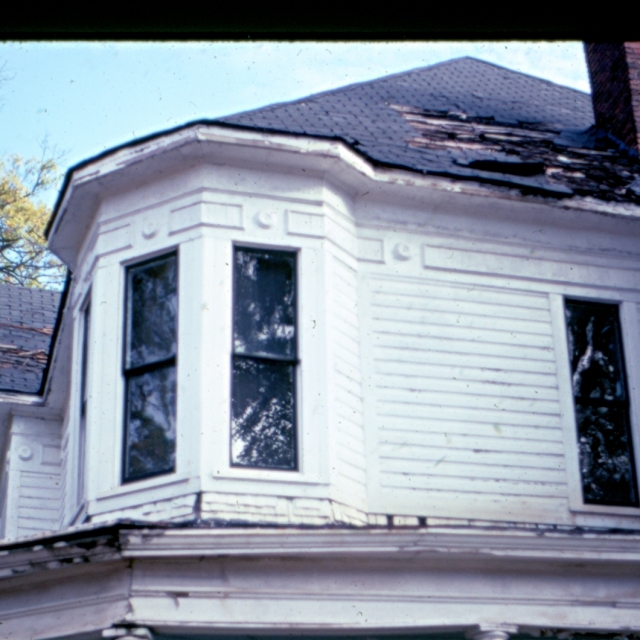 This 1977 image shows the corner location of the original tower that graced the home.