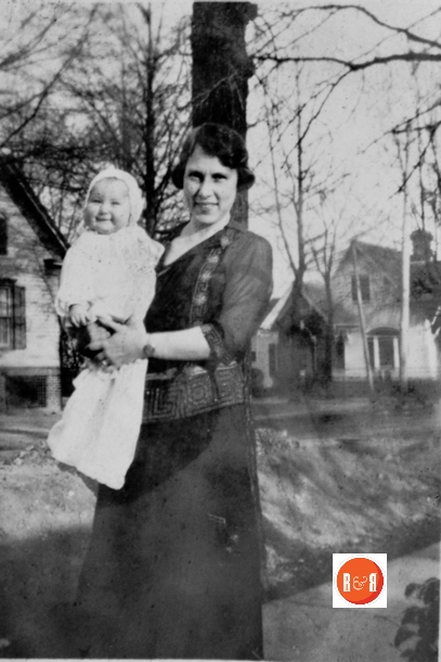 Another image of Mrs. Craig showing the Poag home in the background.