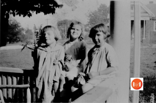The Craig children and friends (UN), with the corner of Wilson and College in the background.