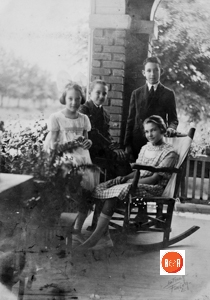 The four Marshall children on a neighbor’s porch having their picture taken.
