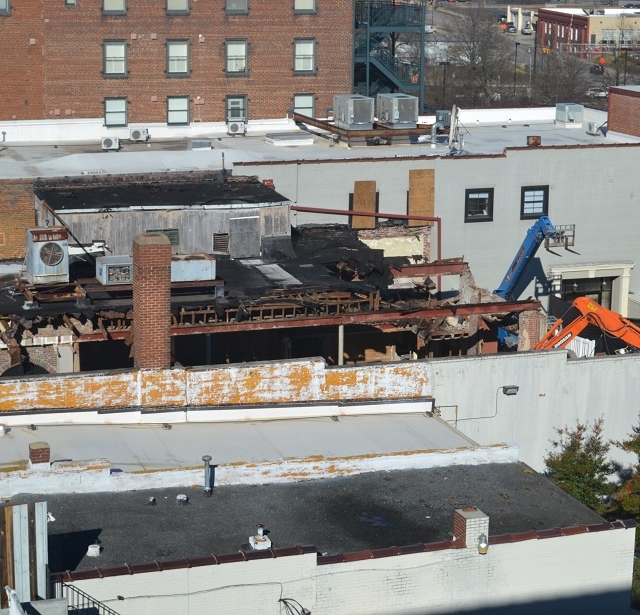 In 2014 the City of Rock Hill demolished this building due to poor construction and the need for additional downtown housing. The roof of the building is the black tar roof. This image was taken on Dec. 12, 2014.