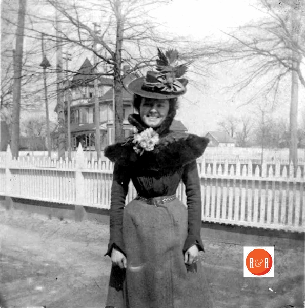 Pauline Davis standing in the Friedheim’s yard with the J.E. Roddey (next to the Wm. L. Roddey home) in the rear view.