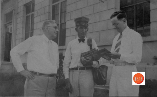 Mr. C.L. Cobb (left) at the Getty’s Building with Col. Lindsey McFadden, Postmaster and Herbert Black the head of the American Legion.