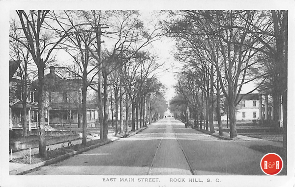 Early postcard image of East Main St., Rock Hill, showing the front porch of the Elk's Club building (right - columns). Courtesy of the AFLLC Collection - 2017