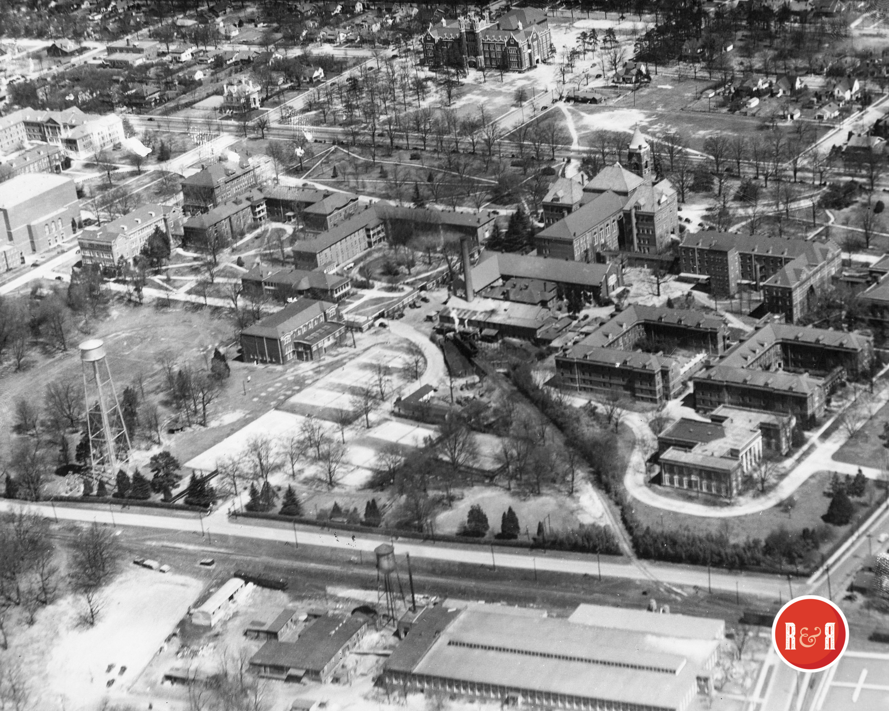 Aerial image of Winthrop Un. in the 1950s, showing the mill just behind the college and railroad tracks. Courtesy of the WU Pettus Archives - 2012