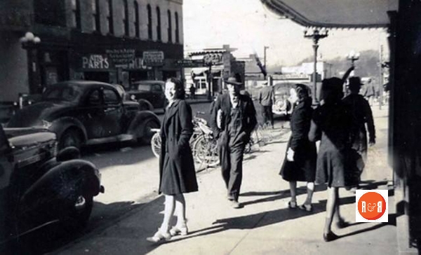 Sidewalk traffic in front of the Stevenson Theater ca. 1940.