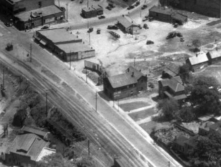 Note this 1934 image of the area known as the “Back Lot” shows three important building. Far left bottom, is the roof of the Rock Hill Water Plant, far middle right the roof of the Palmetto Library (circular driveway), facing South Elm or Trade St., and the flat roof of the local diner on the corner of South Trade and East Black Street. Courtesy of the Cobb – AFLLC Collection.