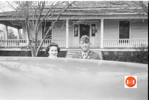 This is the only picture I could find of the front. Notice the latice work. Can see it better. This is Mom with a friend of Dad's. Probably '42 or '43. And the second image is of Harry Goforth, Sr., with Harry, Jr. From this angle you can see the garage/barn that was behind the house. Probably late '45. 