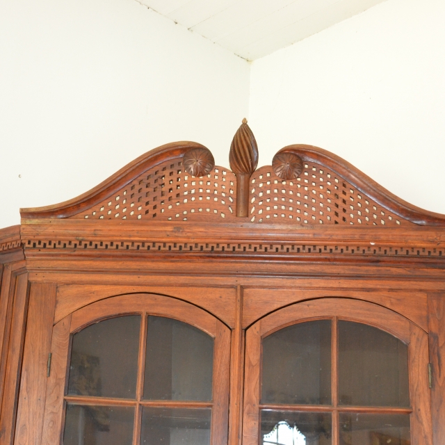 The Sturgis family corner cupboard, with its’ magnificent bonnet top,  is on display at Historic Brattonsville.
