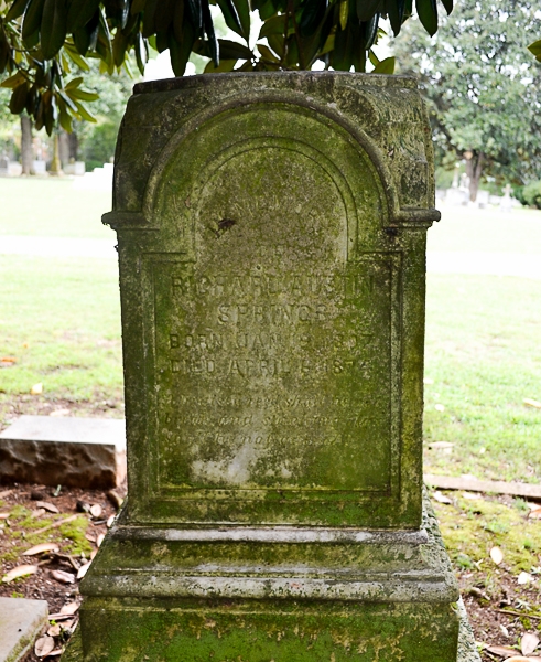 The tombstone of Richard A. Springs has been heavily damaged.