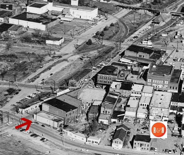 Arrow shows the corner of South Trade Street and Black Street prior to the razing of building all along Trade in ca. 1970s.