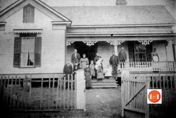 The Peter Garrison family and home ca. 1885.