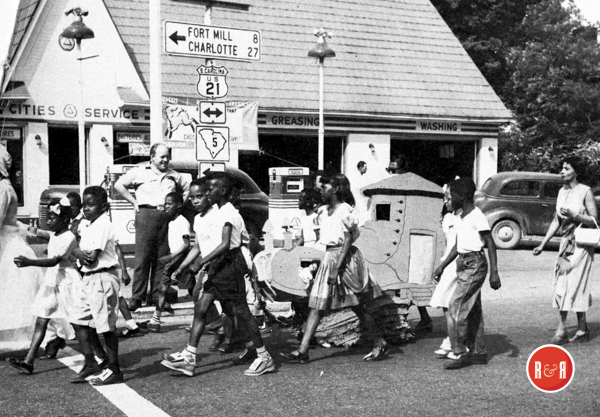 Emmett Scott students on Main Street headed for the Rock Hill parade, ca. 1952