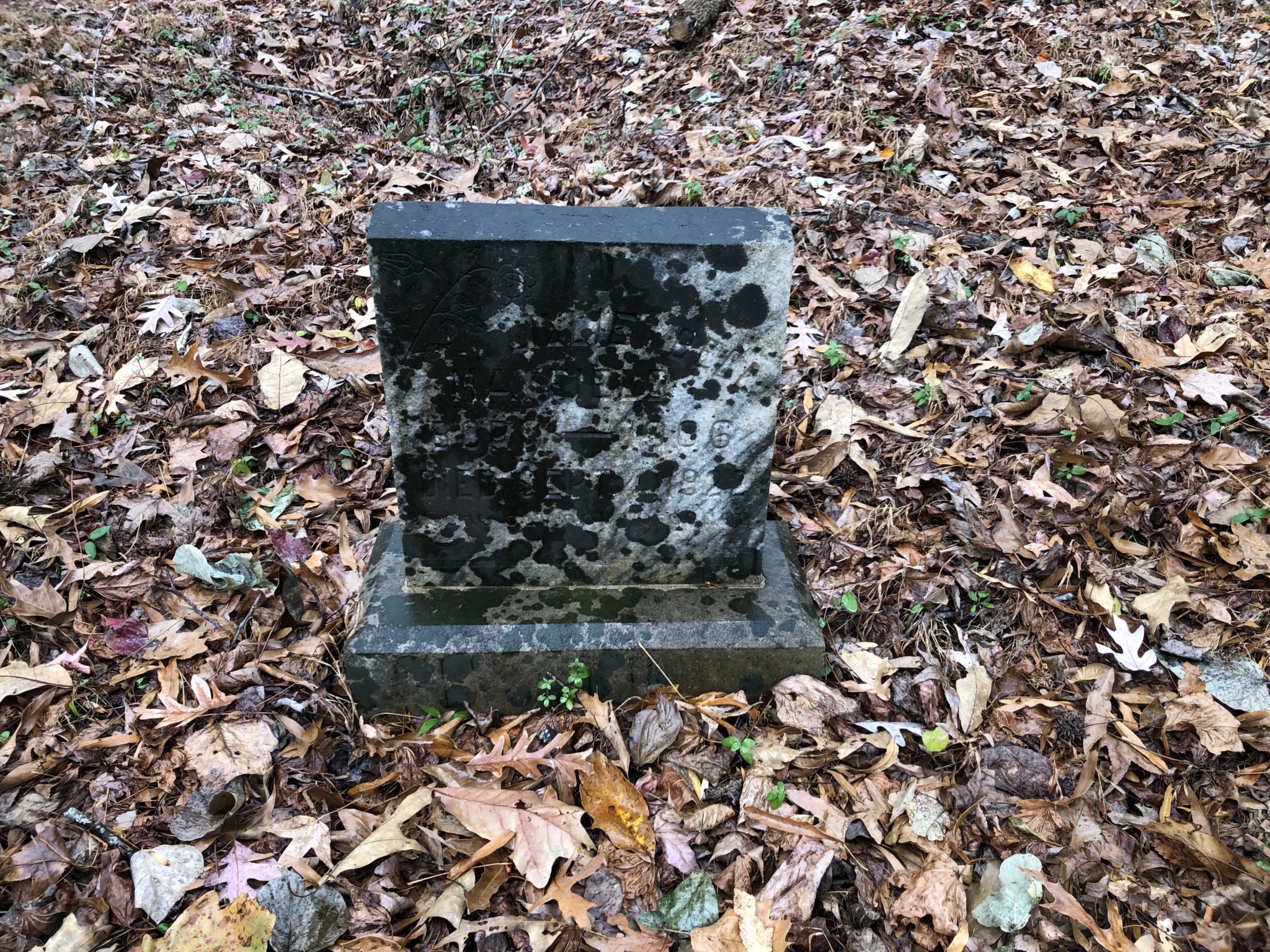 One of the upright tombstones associated with the defunct Crossroads Baptist Church. Courtesy of R&R.com 2022